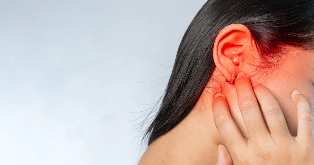 Ear examination with otoscope